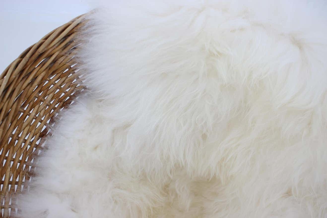 photo furniture 1960s Pair Of Rattan Woven Basket Chair With Icelandic Sheepskin