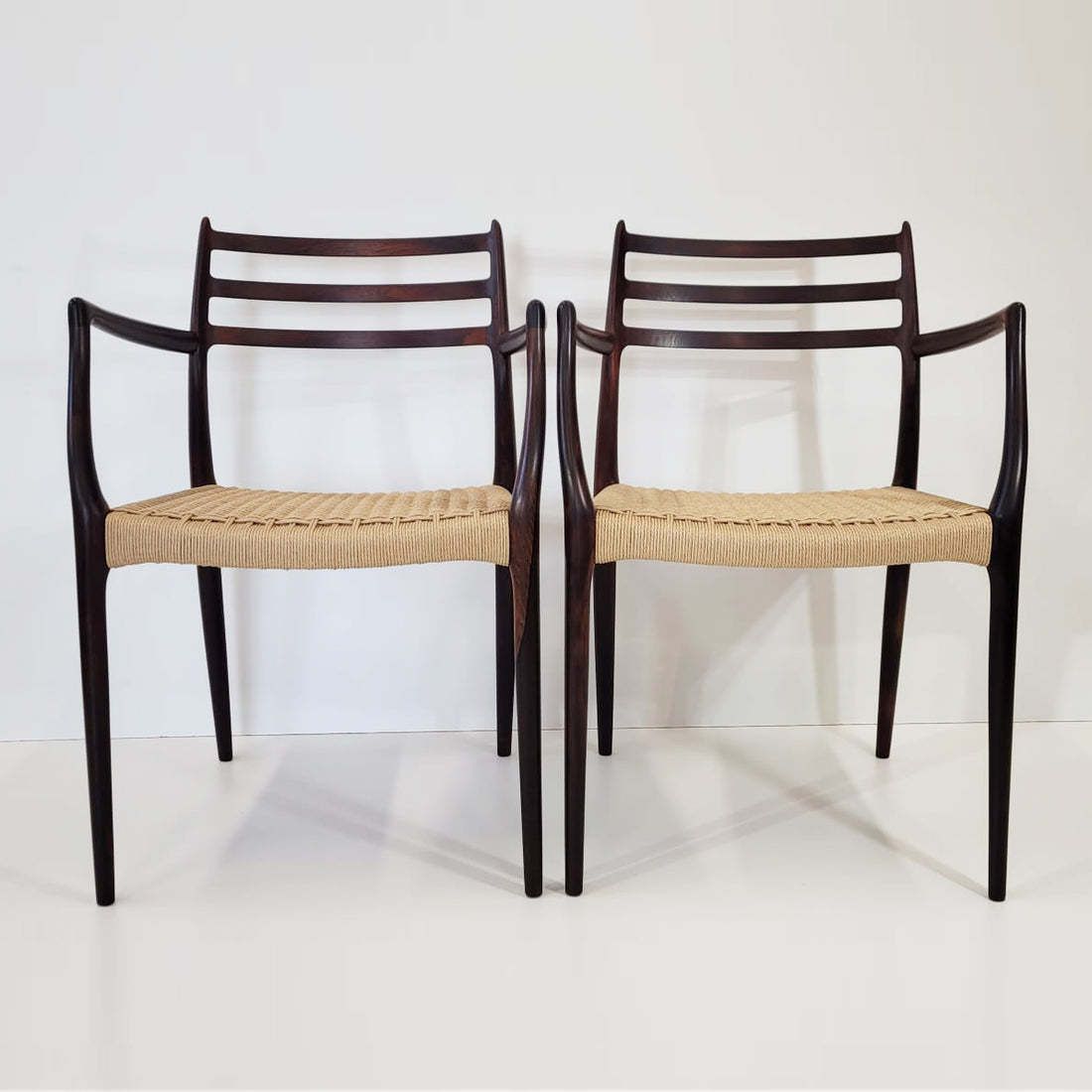 Niels Otto Møller #62 Carver Dining Chair Pair photo furniture