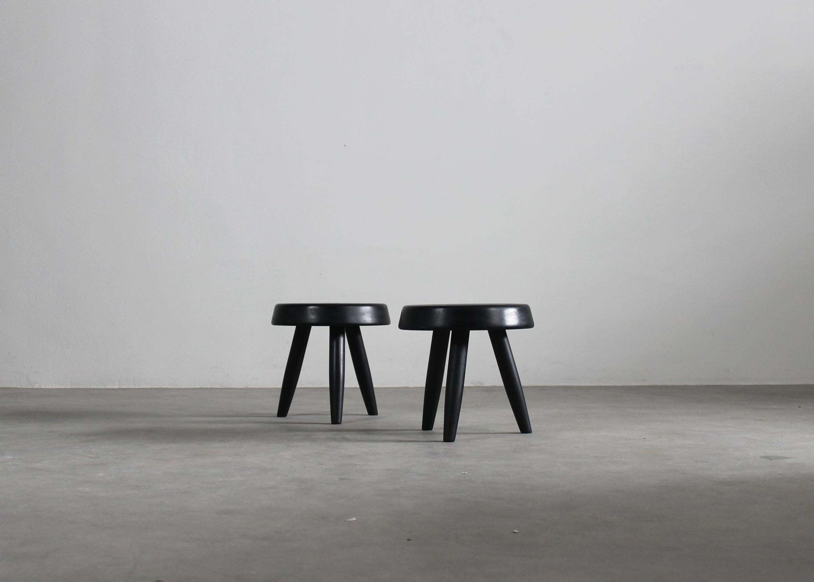 Charlotte Perriand In The Style Of' Set Of Two Black Stools In Wood 1950 photo for sale