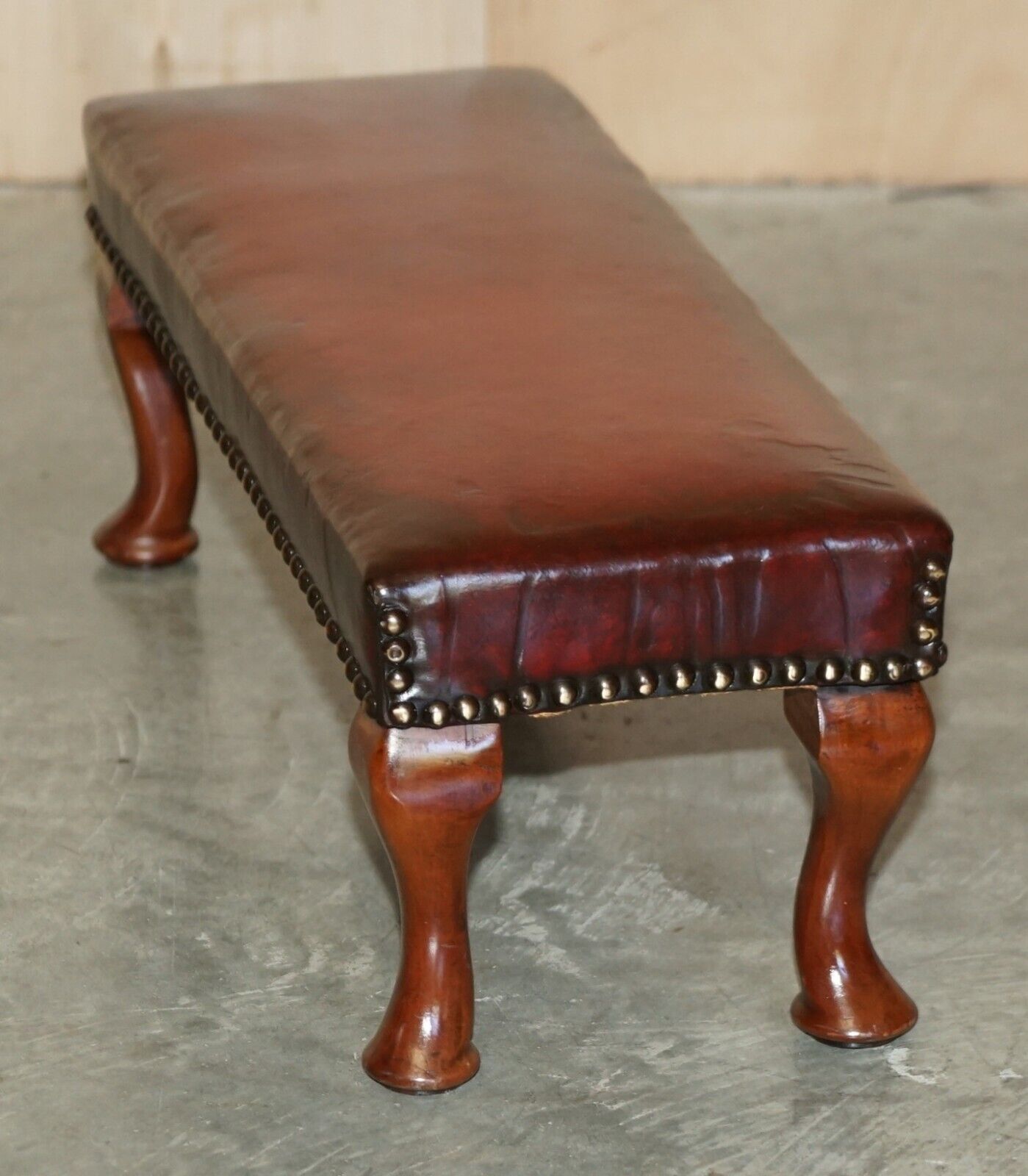photo for sale Antique Cabriolet Leg Fully Restored Hand Dyed Bordeaux Leather Tufted Footstool