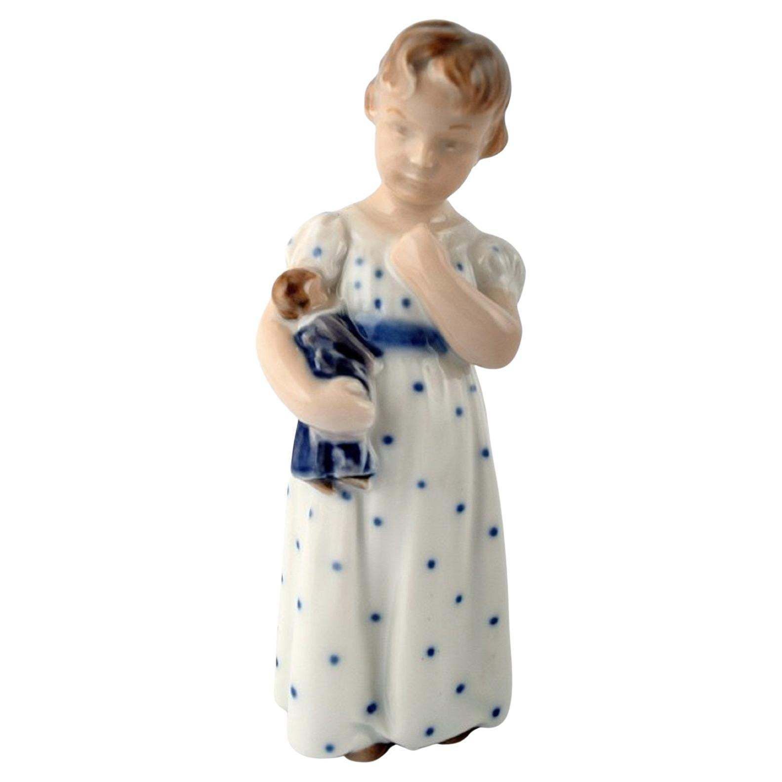 Royal Copenhagen Figurine No. 3539 Girl With A Doll