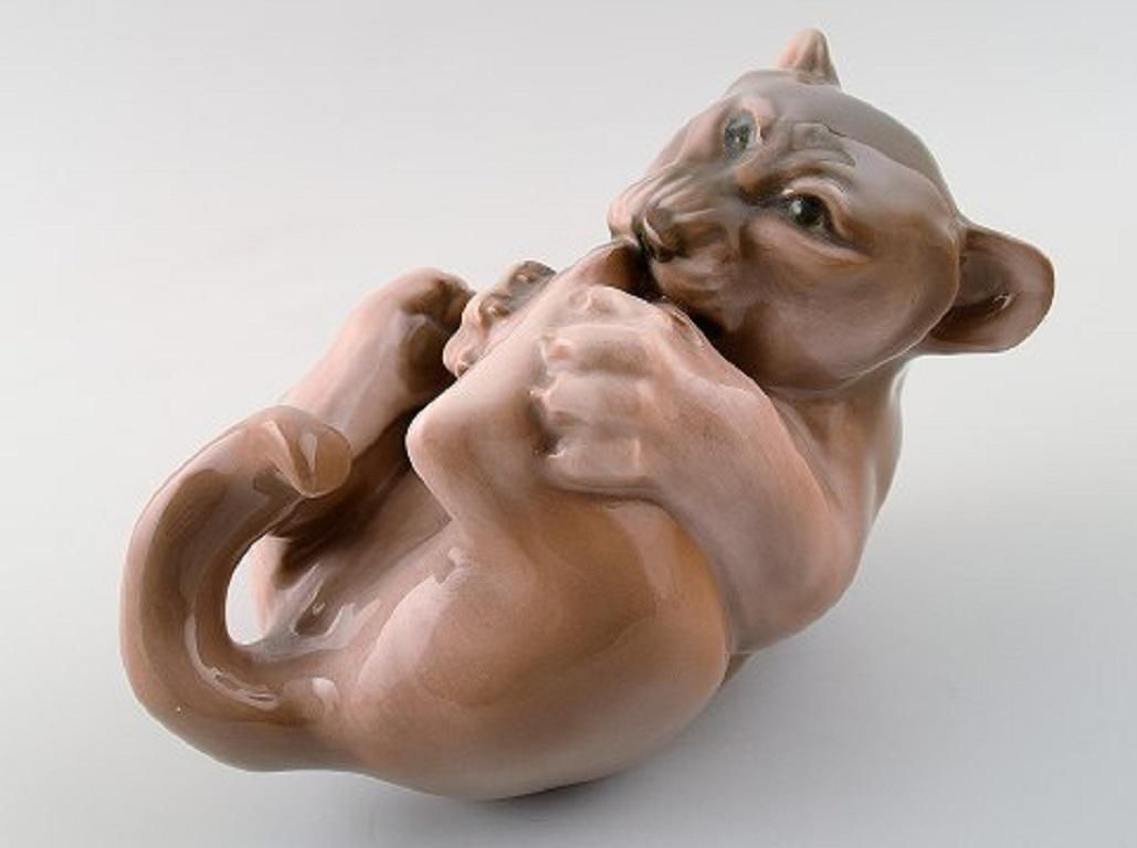 Royal Copenhagen, Lion Cub In Porcelain photo furniture