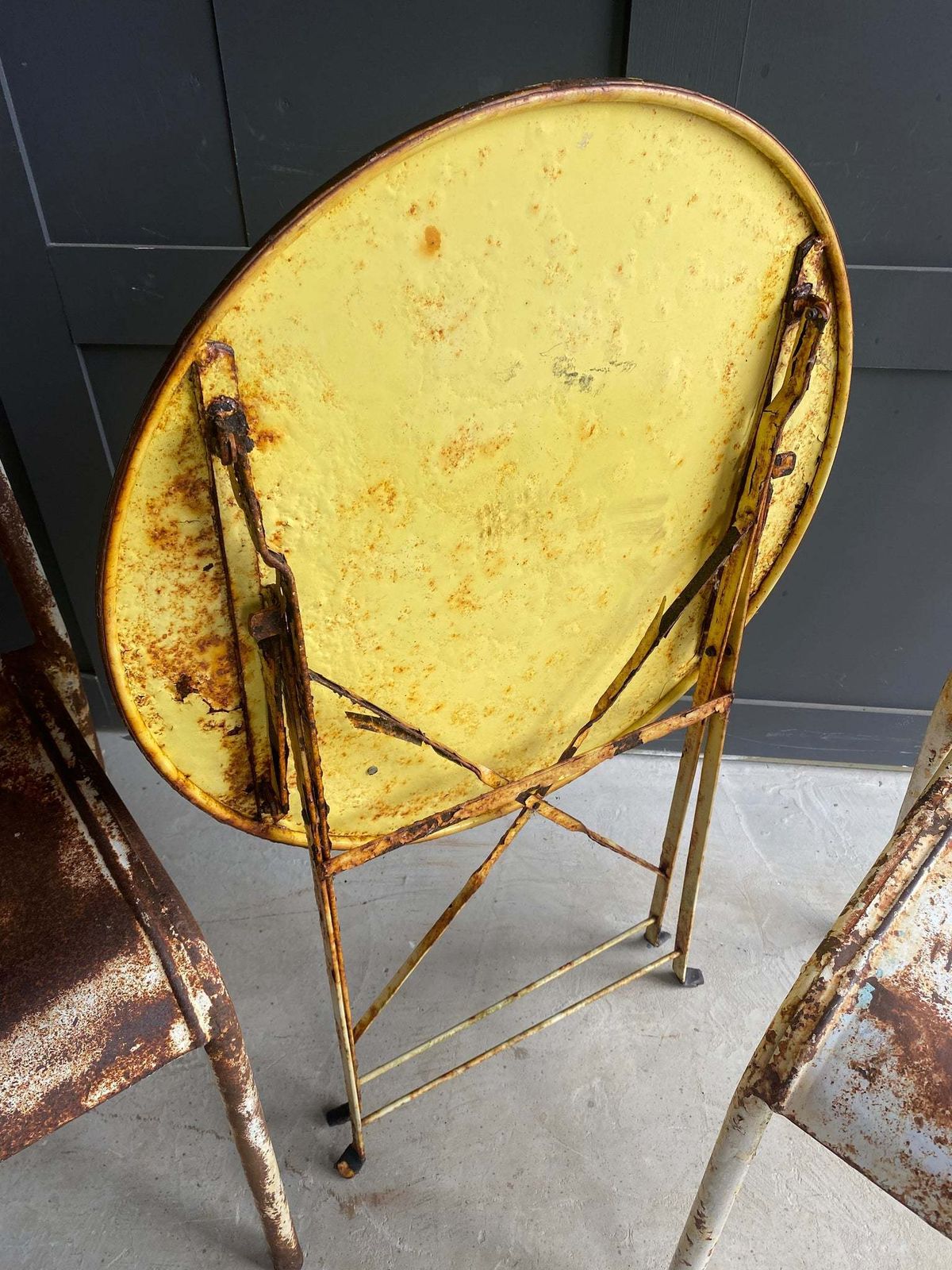 225.0 French Table And 2 Tolix Metal Chairs photo
