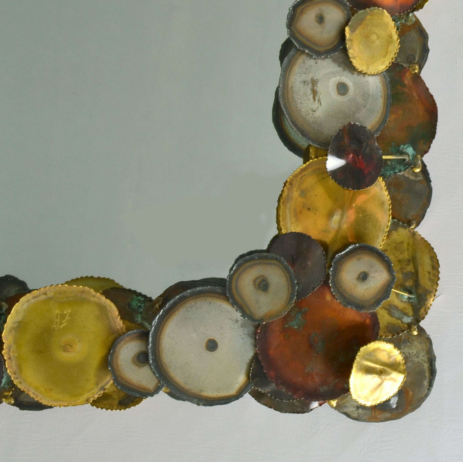 Brutalist Wall Mirror Edged With Metal Circles In The Style Of Curtis photo for sale