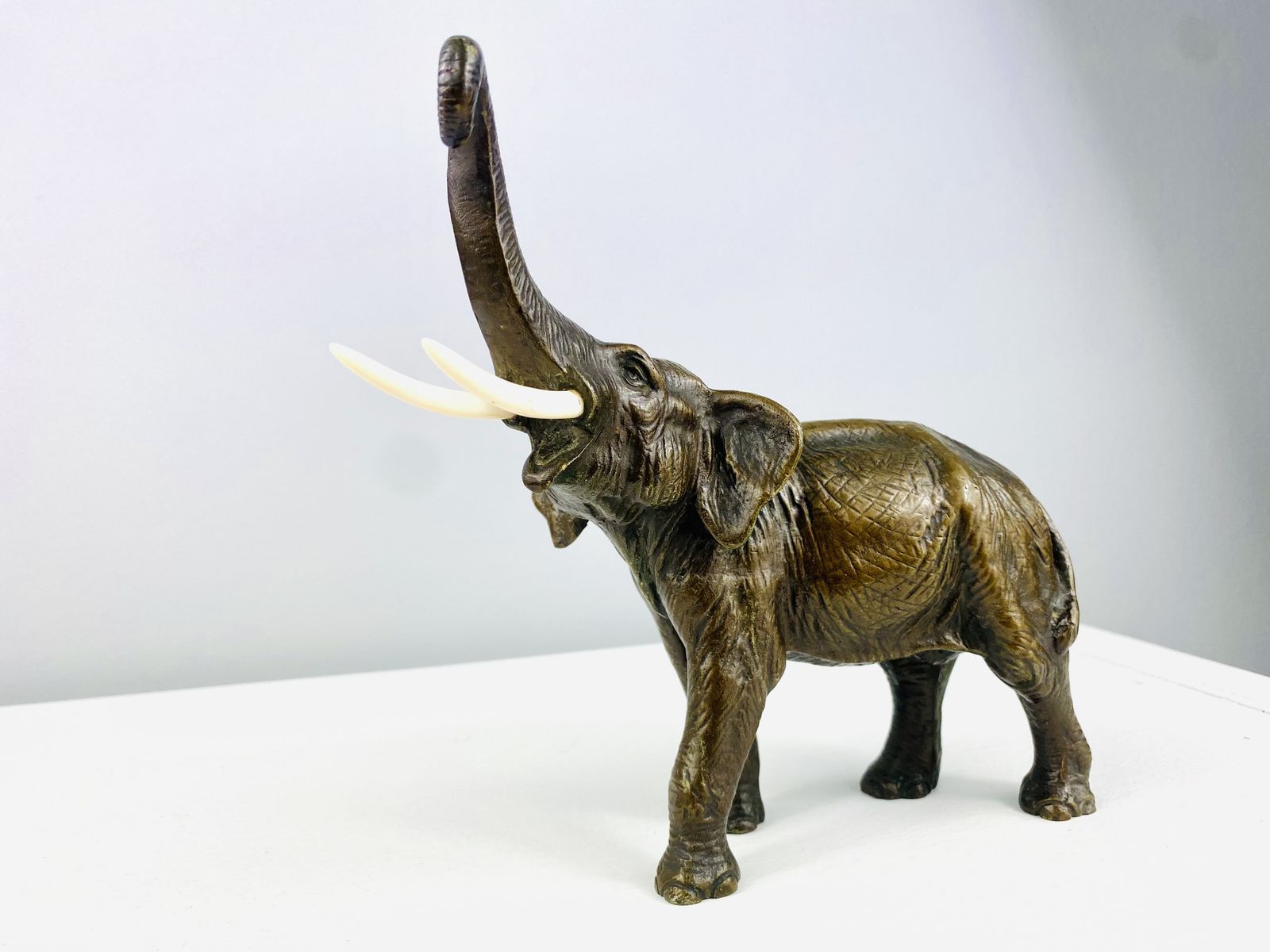 Sculpture Of A Bronze Elephant With Trunk Extended, Made In Austria Circa 1900. photo Home Decor