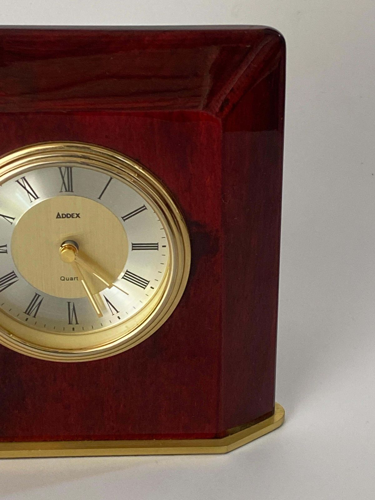 Table Clock Modern Shape Burgundy Color Hard Plastic And Brass France 1970 photo Home Decor