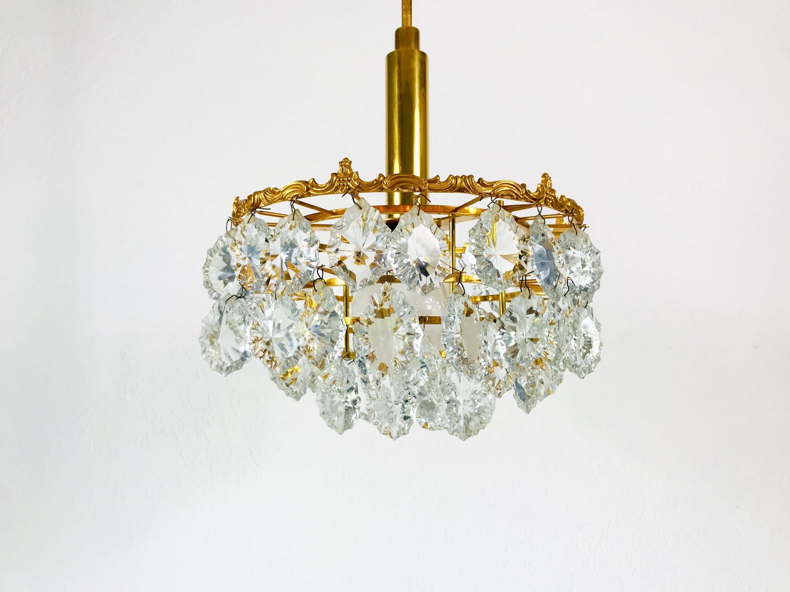 photo furniture Gilt Brass And Crystal Glass 4 Tier Chandelier By Palwa, Germany, 1970s