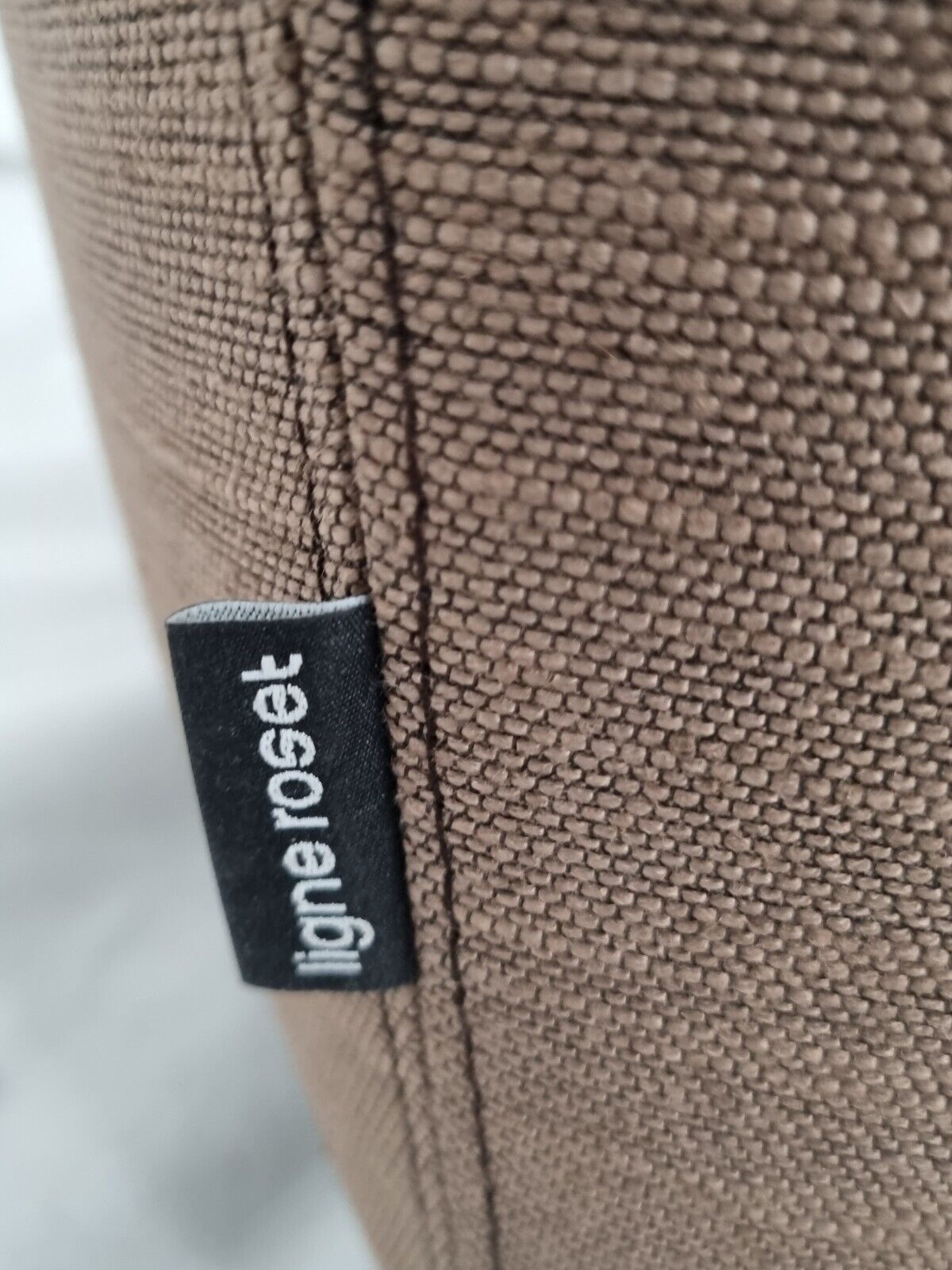 photo furniture Ligne Roset Lounge Chair In Flecked Weave In Tobacco