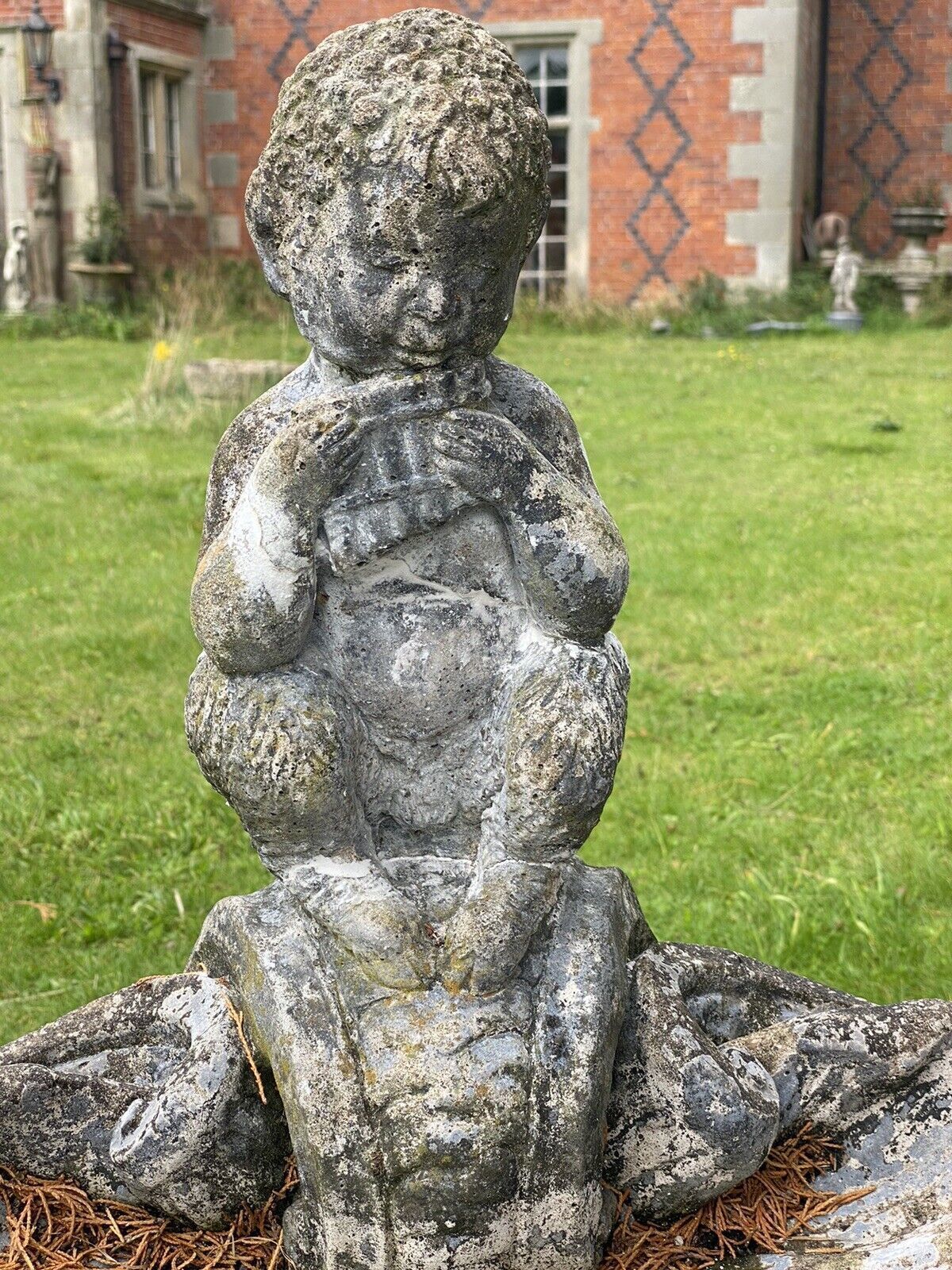 Garden Decor Mythological Water Feature Centrepiece Of Faun Boy Sat Upon Scalloped Bowl photo