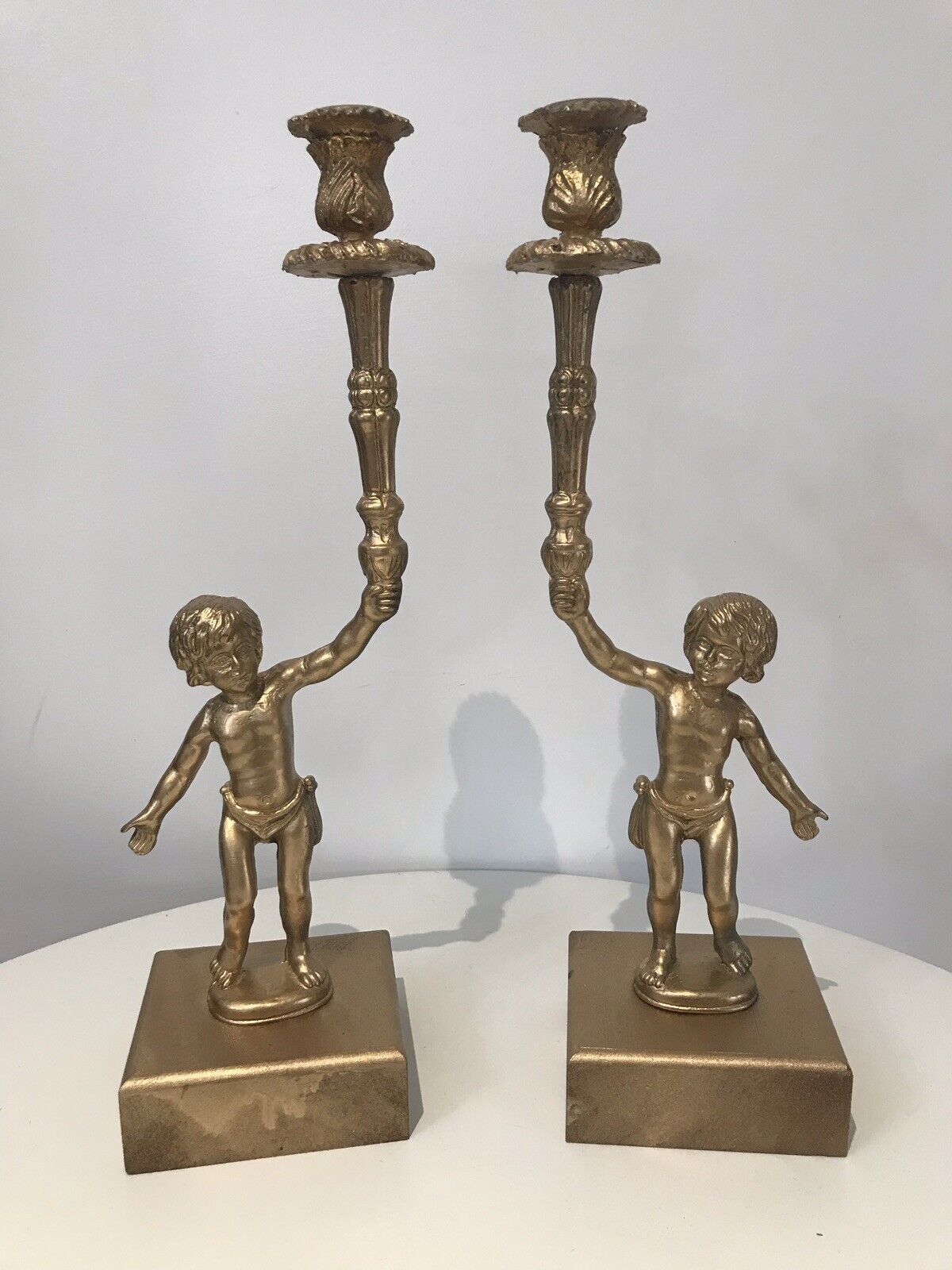 Stunning Pair Of Bronze Guilded Cherib Candelabras photo furniture