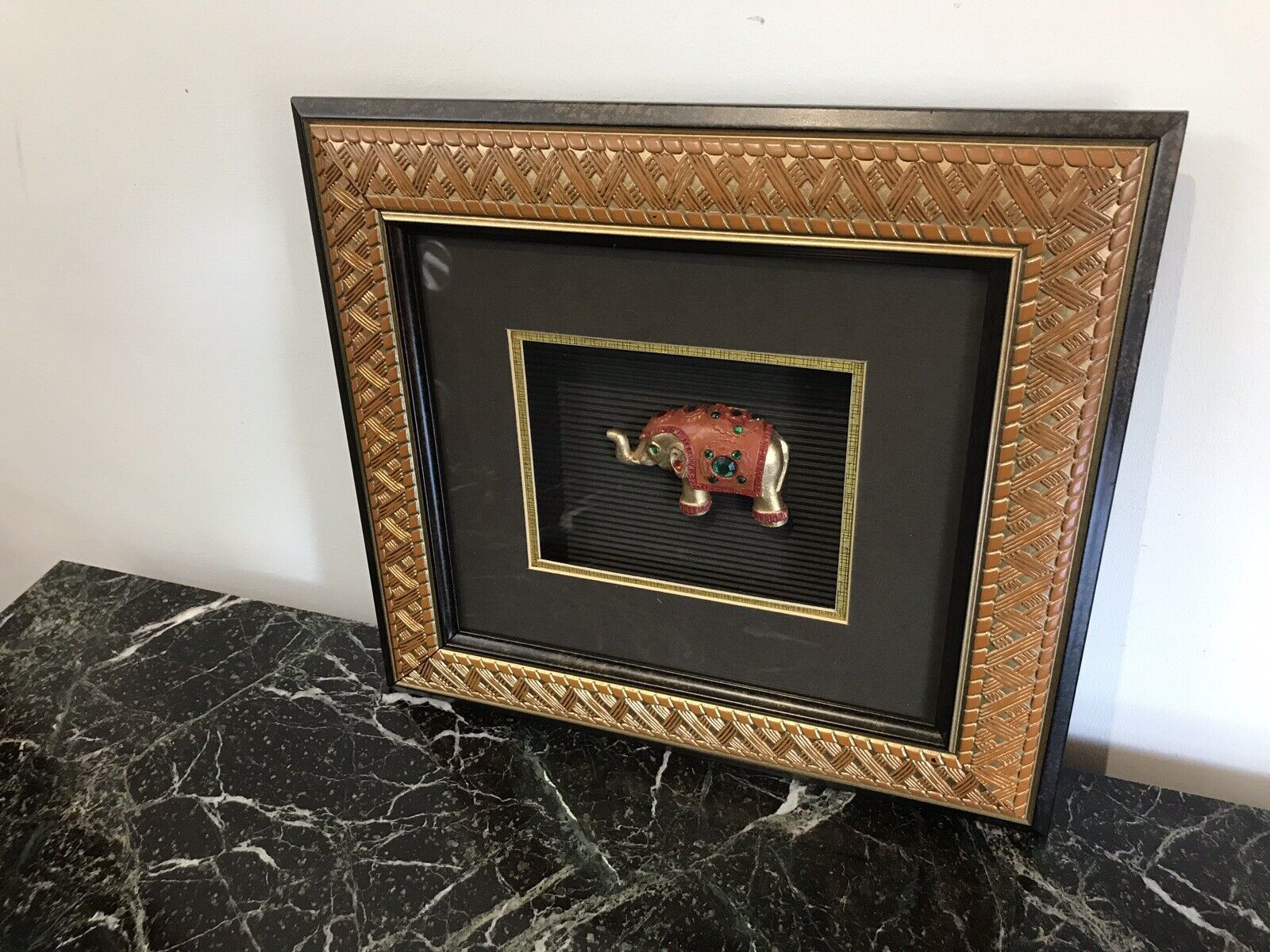 Indian Minature Carved Elephant In A Carved Guilt Picture Frame photo for sale