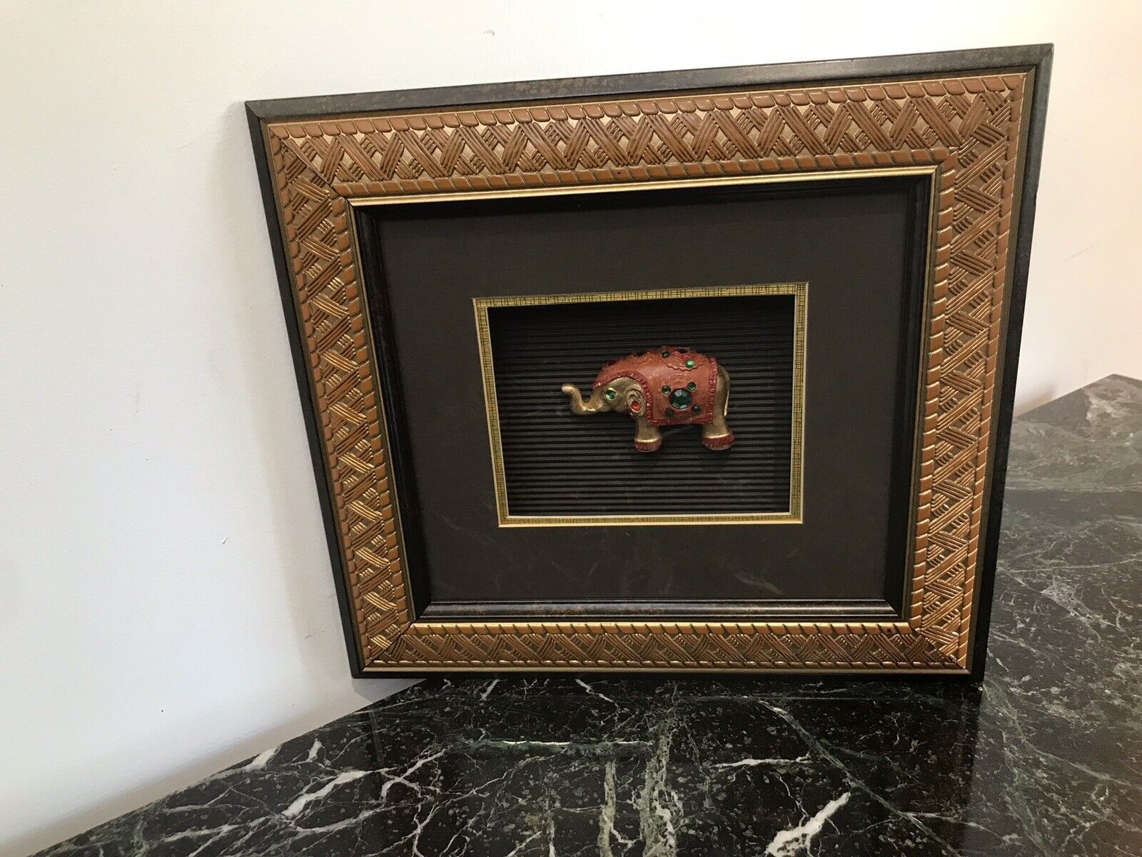 Indian Minature Carved Elephant In A Carved Guilt Picture Frame photo vinterior