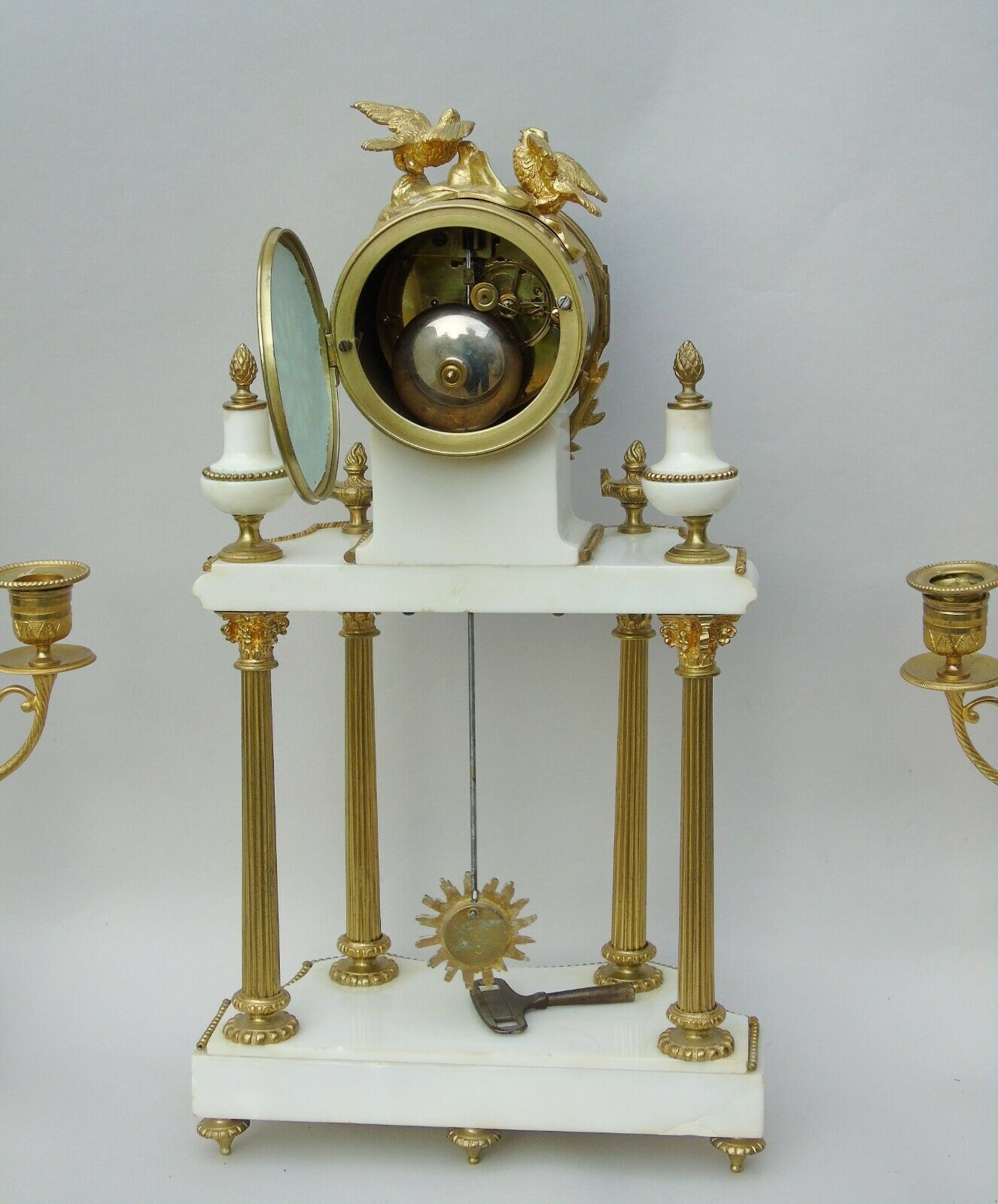 photo furniture Antique Marble Portico Clock Garniture