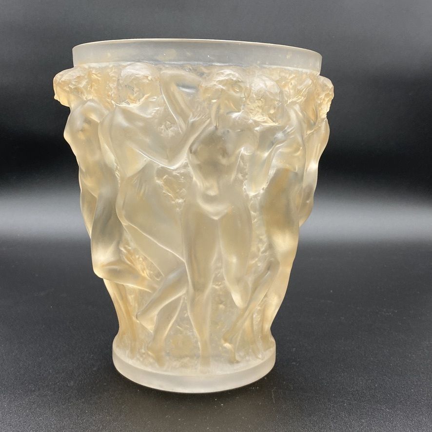 photo furniture A Rene Lalique Bacchantes Vase In White And Sienna Patinated Glass.