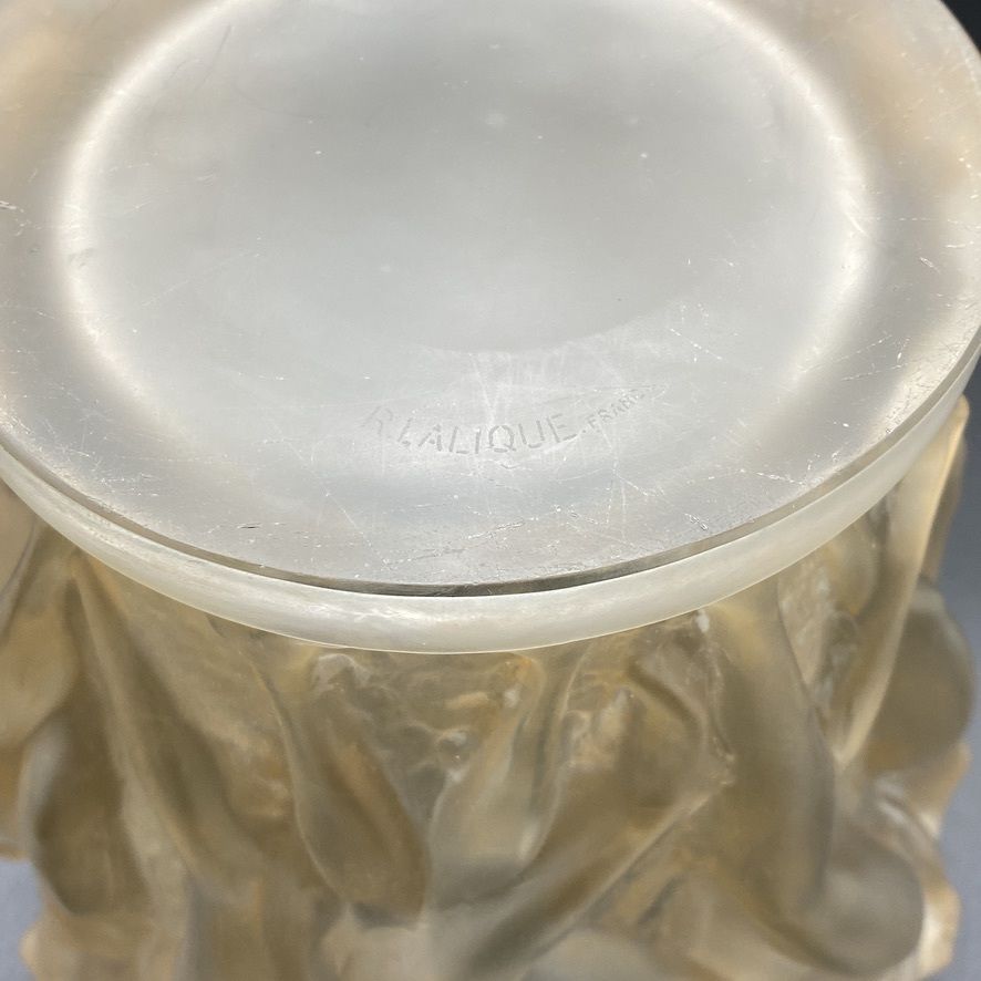 photo vintage A Rene Lalique Bacchantes Vase In White And Sienna Patinated Glass.