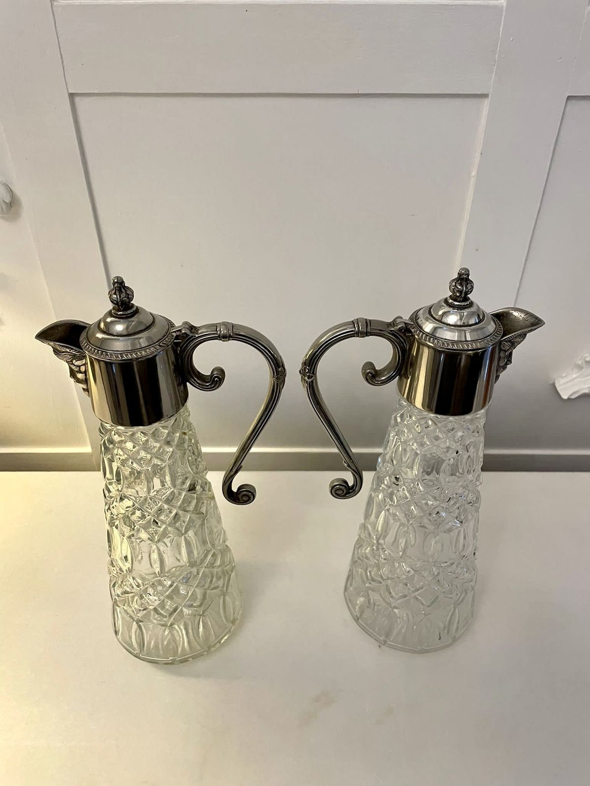 photo for sale Pair Of Antique Early 20th Century Quality Silver Plated And Cut Glass Claret Jugs