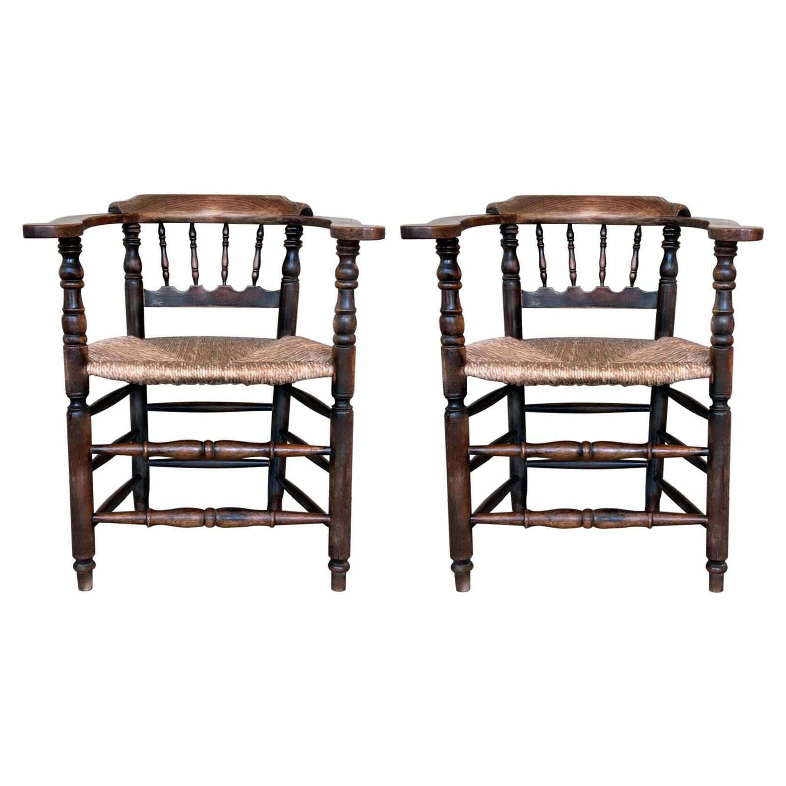 Pair Of Spanish Horseshoe Back And Cane Armchairs