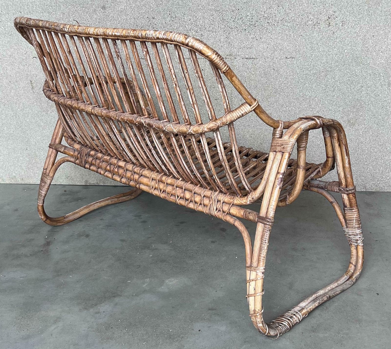 photo for sale Vintage Mid Century Modern Rattan And Bamboo Love Seat Or Sofa, 1960s