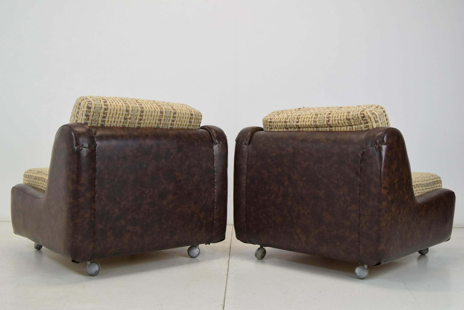 724.0 Pair Of Mid Century Leatherette Armchairs On The Wheels,1970's. photo