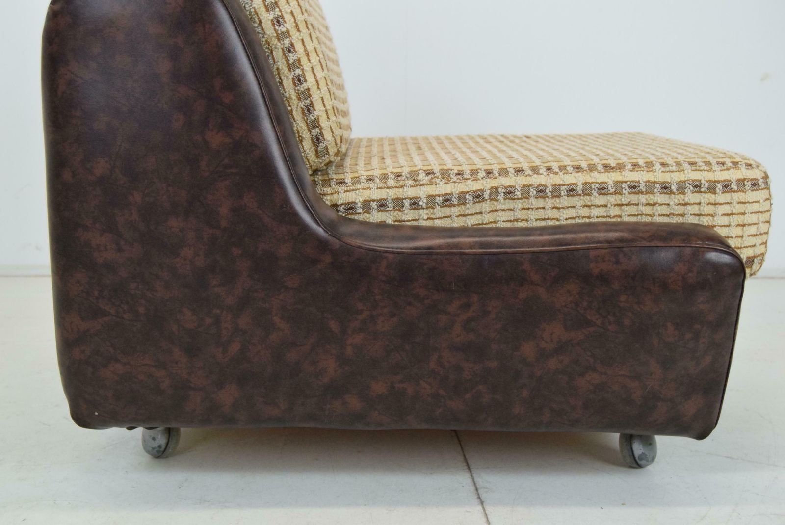 photo furniture Mid Century Leatherette Armchair On The Wheels,1970's.