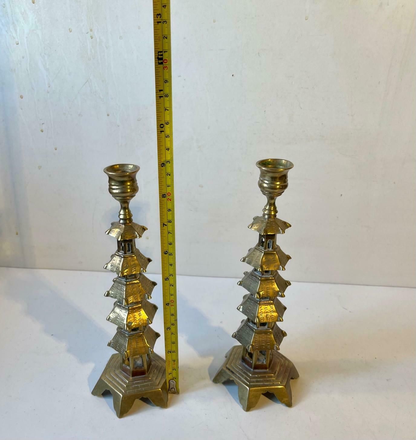 Pair Of Old Chinese Pagoda Candlesticks In Brass photo buy