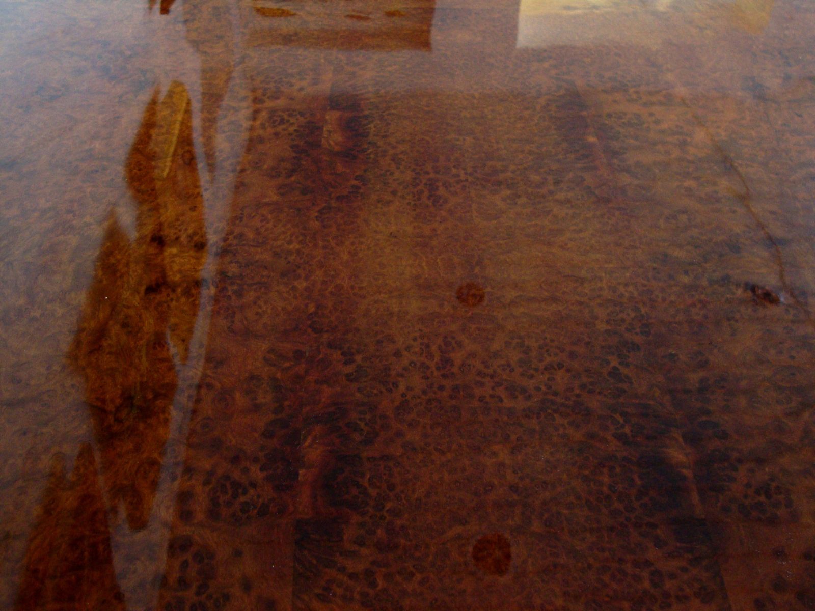 A French Mahogany, Ambonia And Brass Dining Table photo for sale