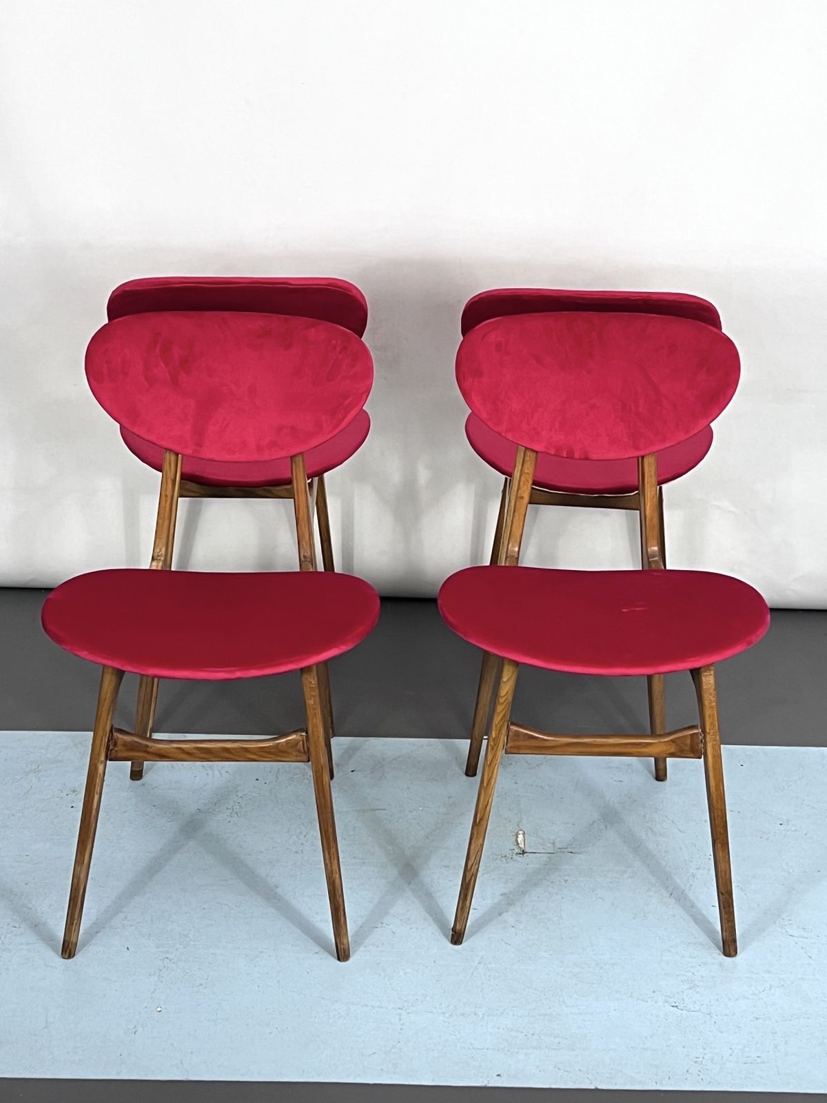 Mid Century Set Of Four Red Velvet And Wood Dining Chairs. Italy 1950s photo vintage