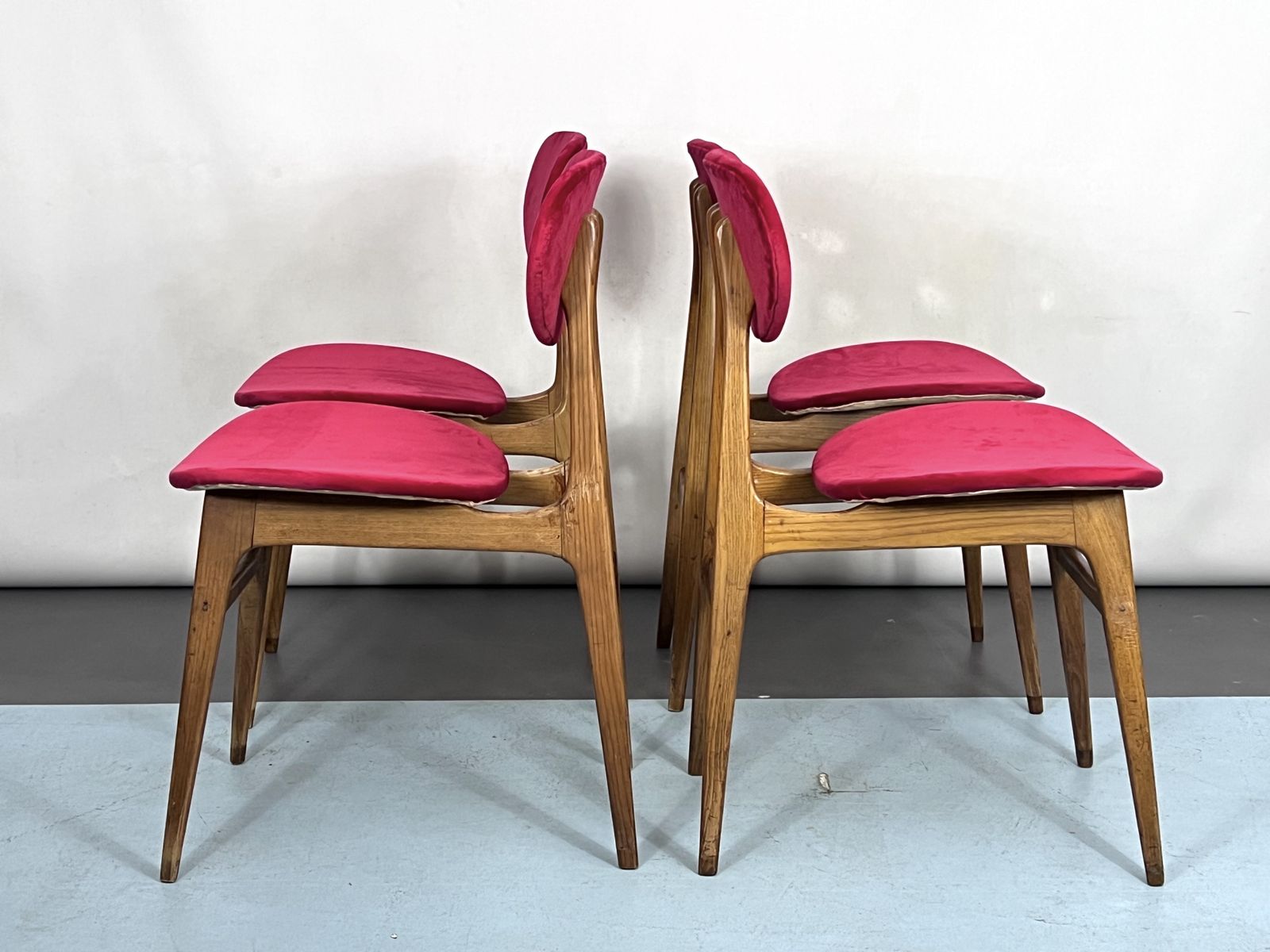 photo furniture Mid Century Set Of Four Red Velvet And Wood Dining Chairs. Italy 1950s