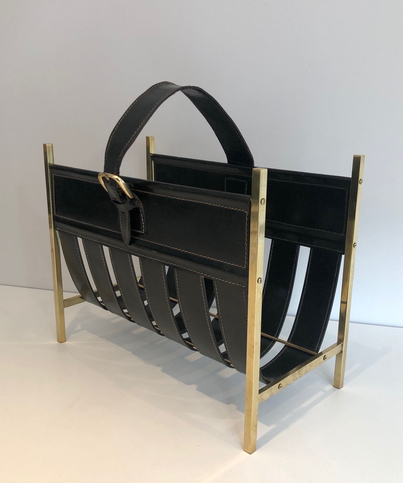 Brass And Leather Magazine Rack Representing A Handbag. Work Of Jacques Adnet. Around 1940 photo 1950.0
