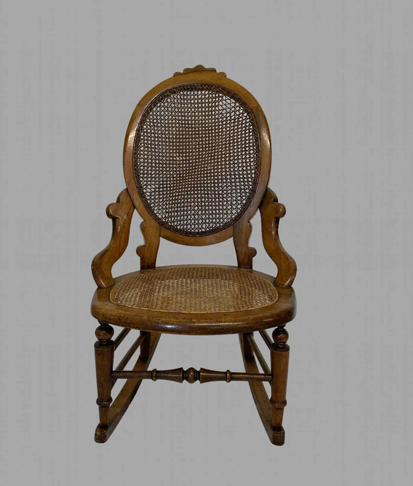 A Lovely Fruitwood Bergere  Rocking Chair