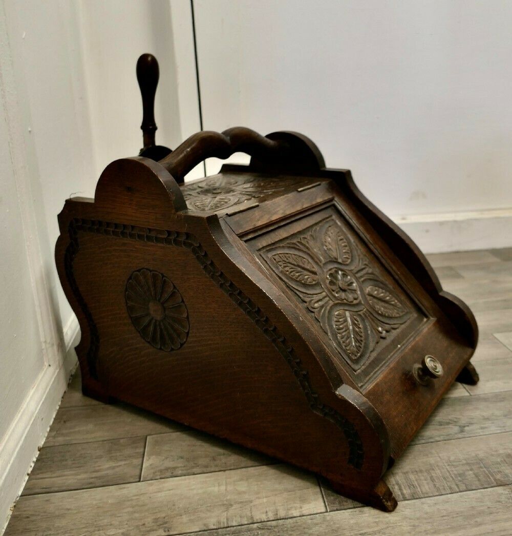 A Carved Arts And Crafts Oak Coal Box With Liner And Shovel photo furniture