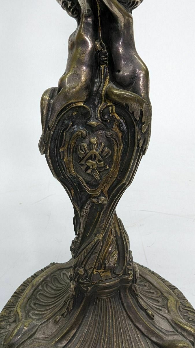 Pair Of Silvered Bronze Candlesticks With 19th Century Cherubs photo for sale