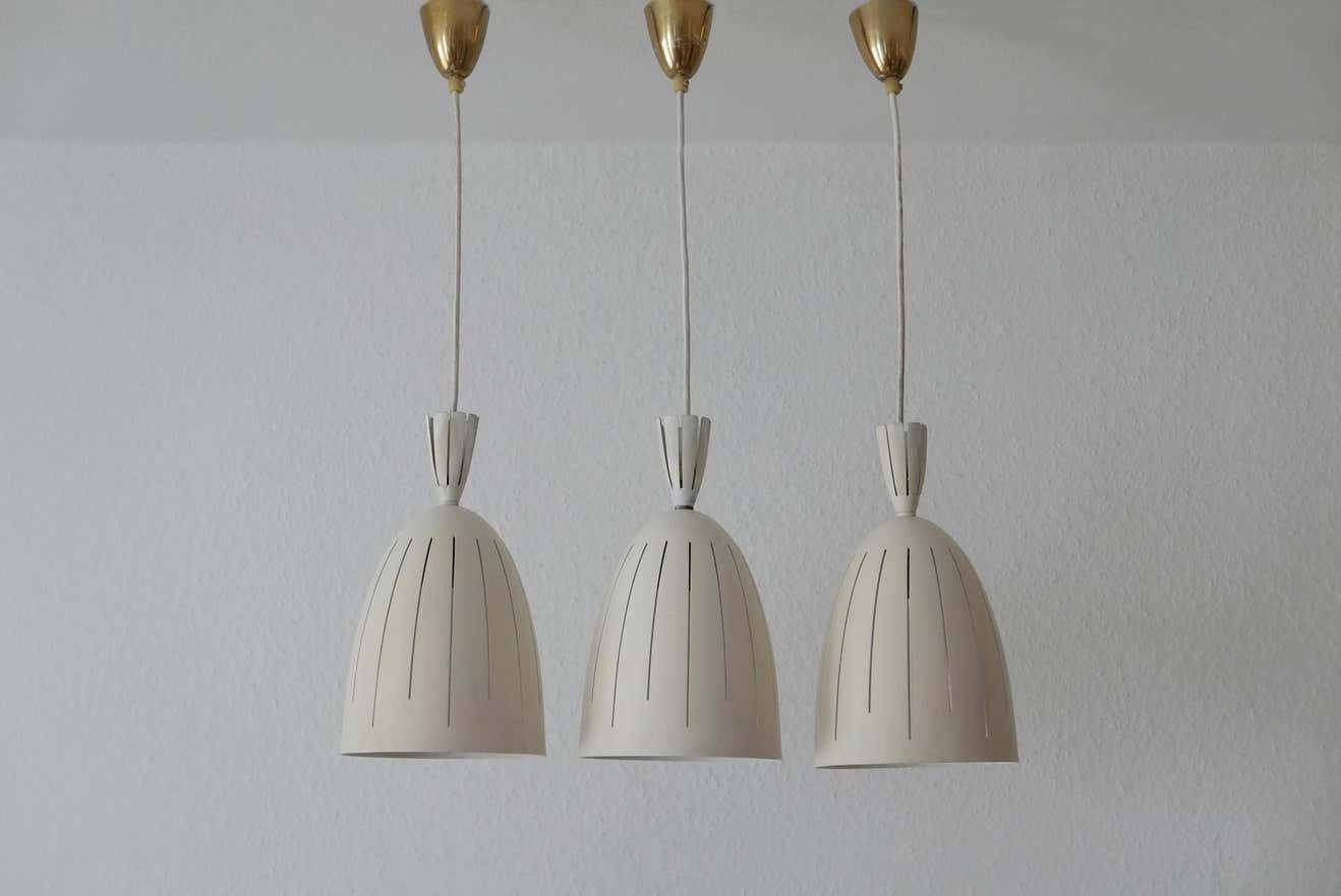 Set Of Three Lovely Mid Century Modern Diabolo Pendant Lamps, 1950s, Germany photo for sale