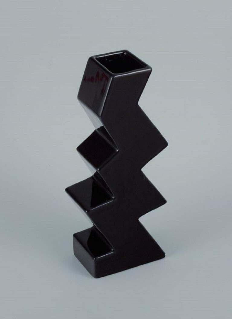 Unique Vase In A Zigzag Shape And Black Glaze. Late 1900s photo furniture