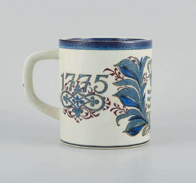 Nils Thorsson For Royal Copenhagen, Anniversary Mug In Earthenware, 1775 1975 photo furniture