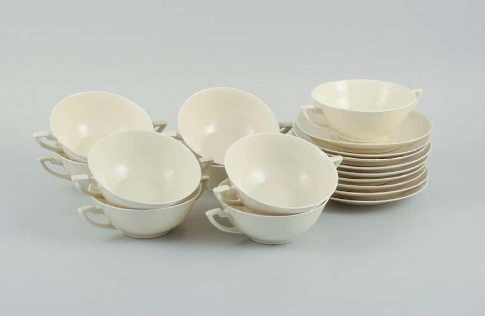 Nine Pairs Of Royal Copenhagen Cream Coloured Bouillon Cups With Saucers photo furniture