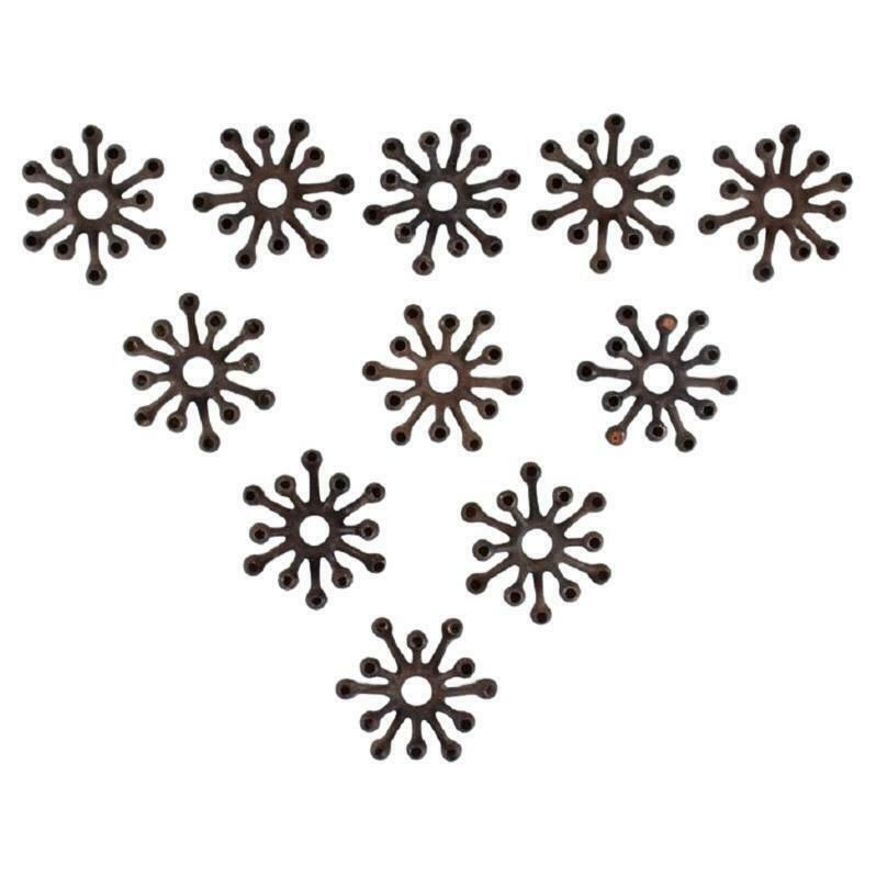 Jens H. Quistgaard, Collection Of Eleven Candlesticks In Cast Iron