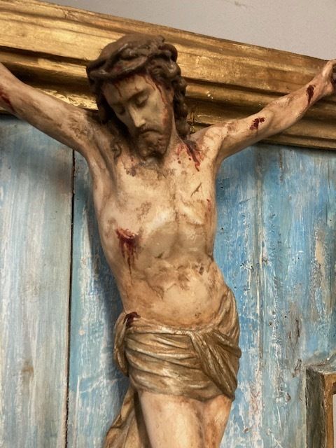 Ancient Plaster Sculpture Of Christ Crucified From The 17th Century. photo vinterior