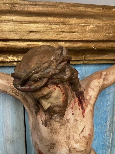 Ancient Plaster Sculpture Of Christ Crucified From The 17th Century. photo buy