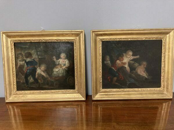 photo furniture Ancient Pair Of 18th Century Paintings "Gioco Di Putti" In Gold Leaf Frame.