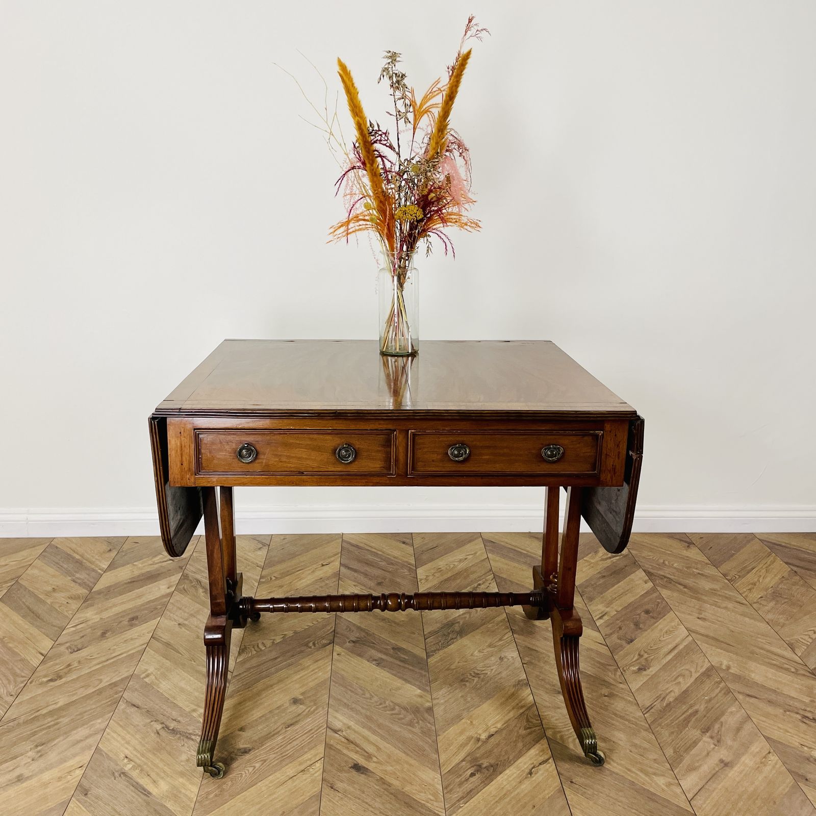 Antique English Mahogany Drop Leaf Stretcher Table On Castors, 19th Century