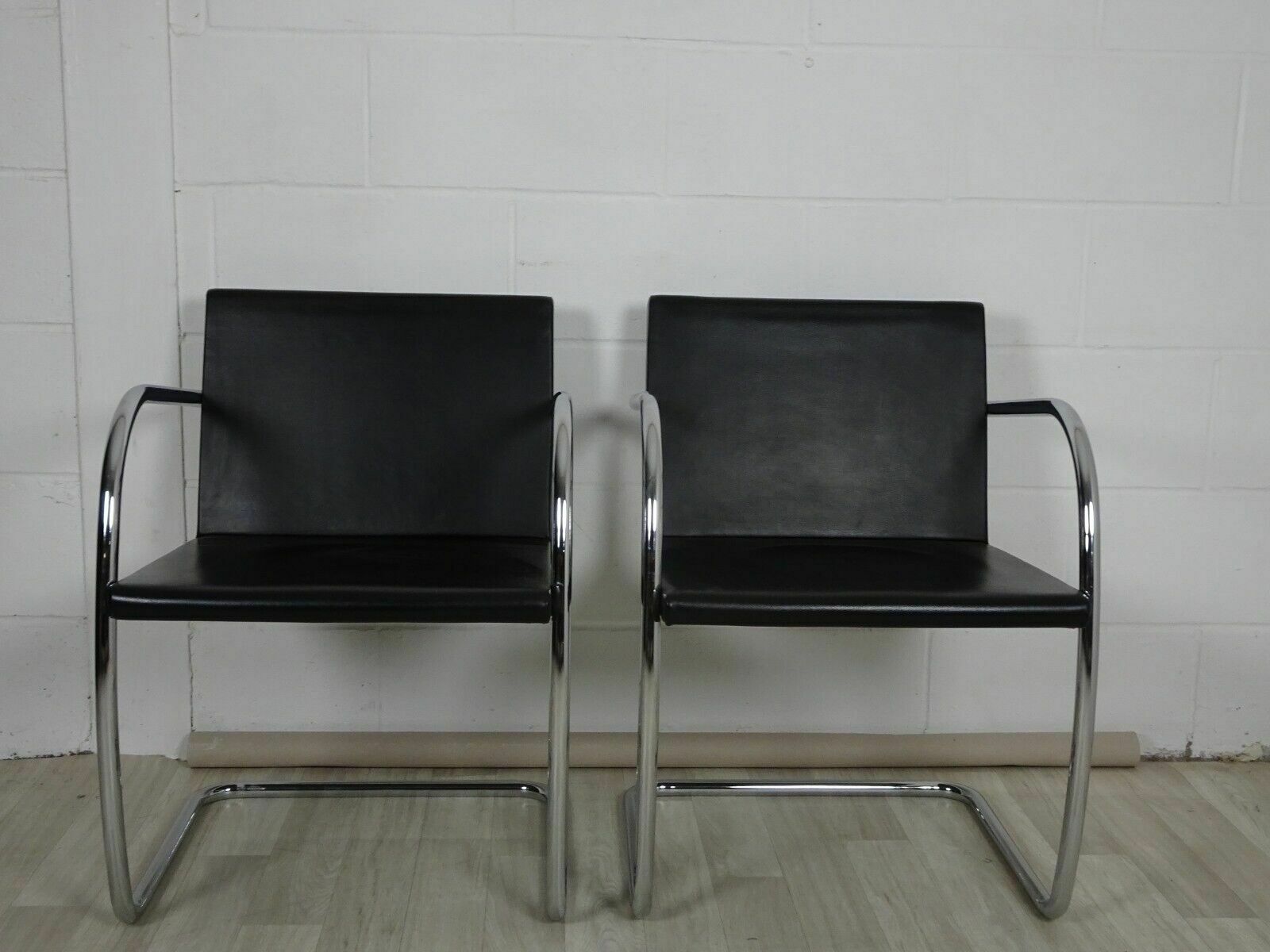 A Pair Of Knoll Studio Mies Vander Brno Chairs In Black Leather