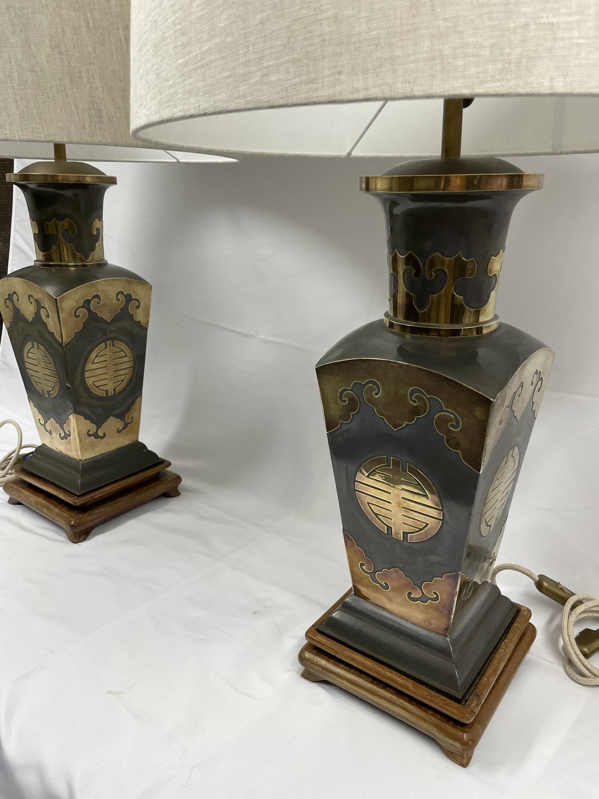 Pair Of Metal Lamps With Brass Applications On Wooden Bases.  50's
