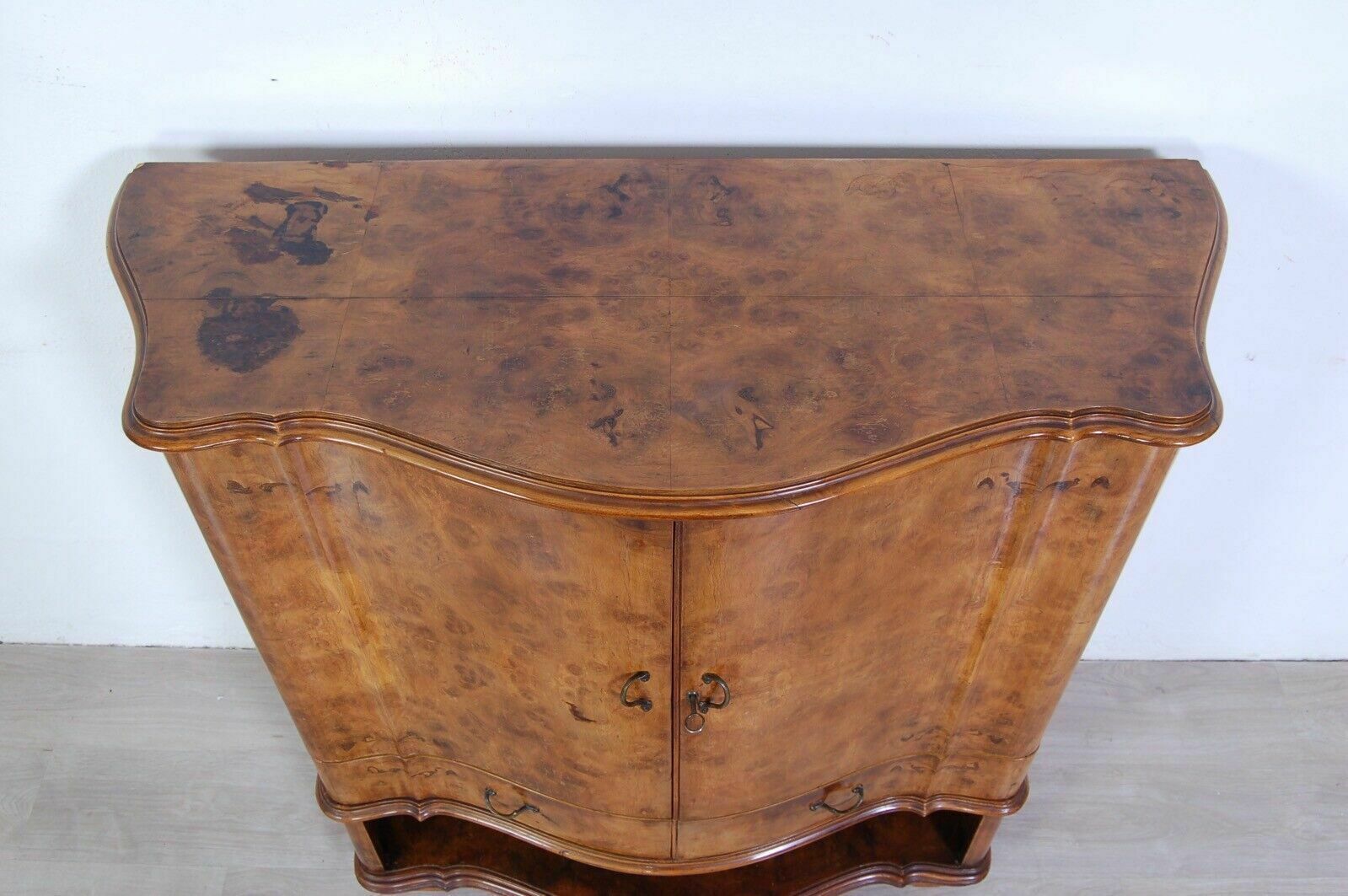 photo furniture Vintage Furniture Design From The 50s. Bar Cabinet In Briar With Mirror Fronte Mosso