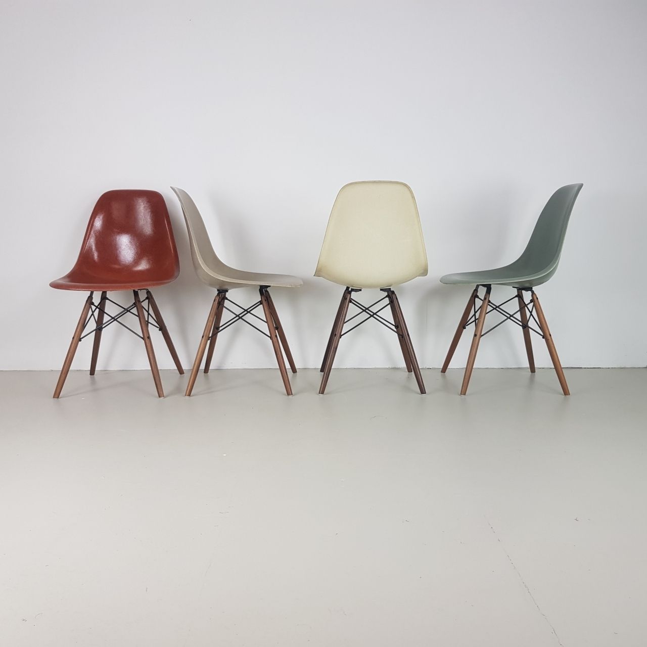 Eames Herman Miller Dsw Side Chairs In Terracotta Seafoam Green Light Greige And Parchment photo furniture