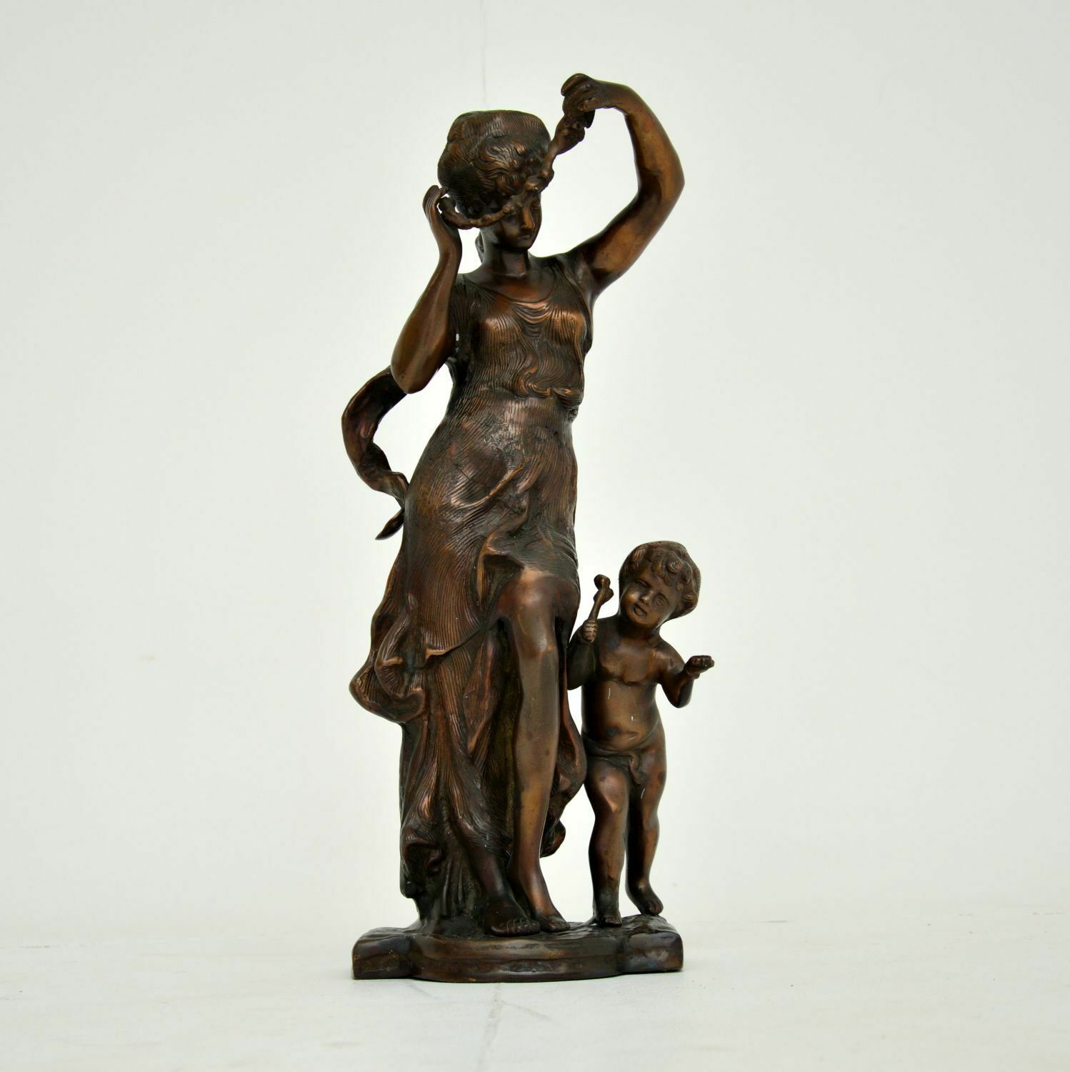 Antique Bronze Sculpture Of Woman And Child photo furniture