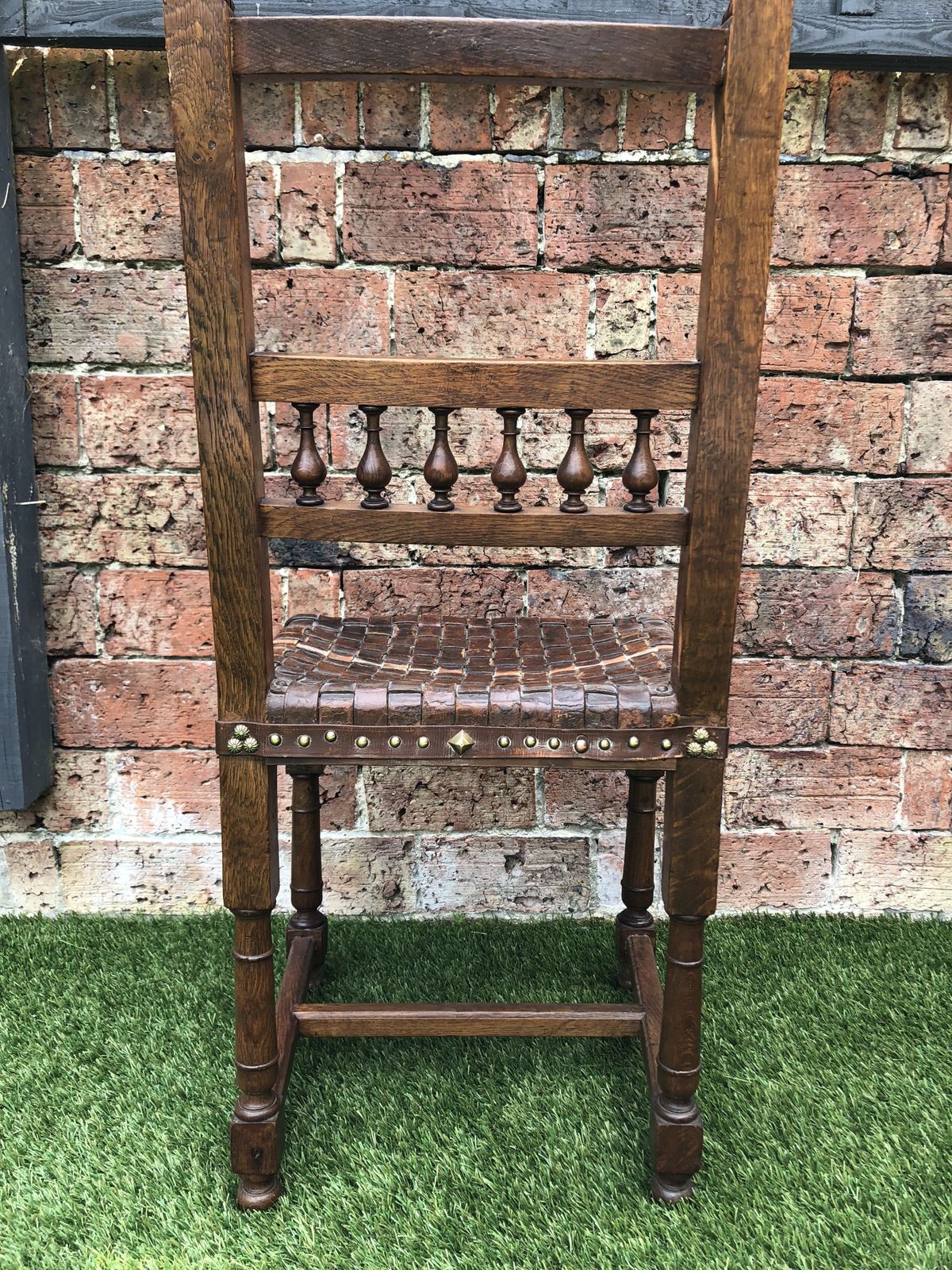 The Arts & Craft Chair, Unusual Antique Oak Lions Head Carved Leather Webbed Seat Chair With Brass Studding.