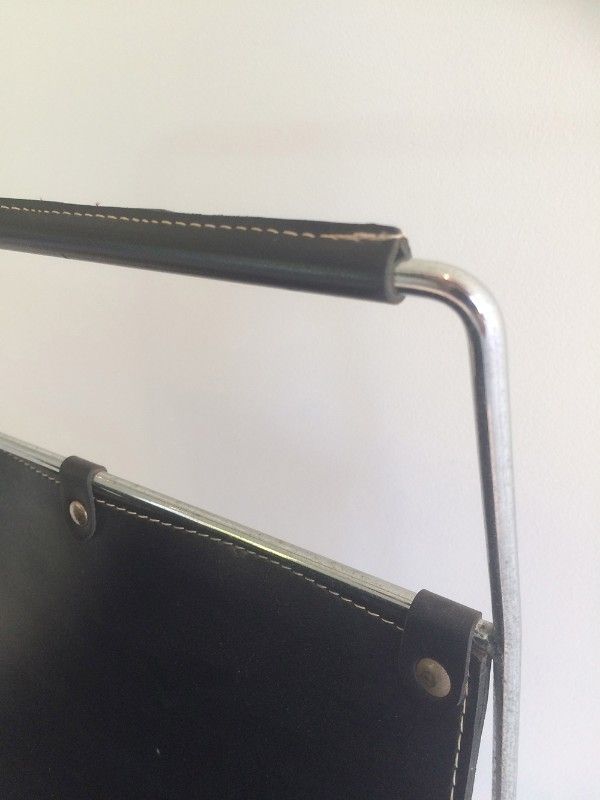 Black Leather And Chrome Magazine Rack photo 540.0