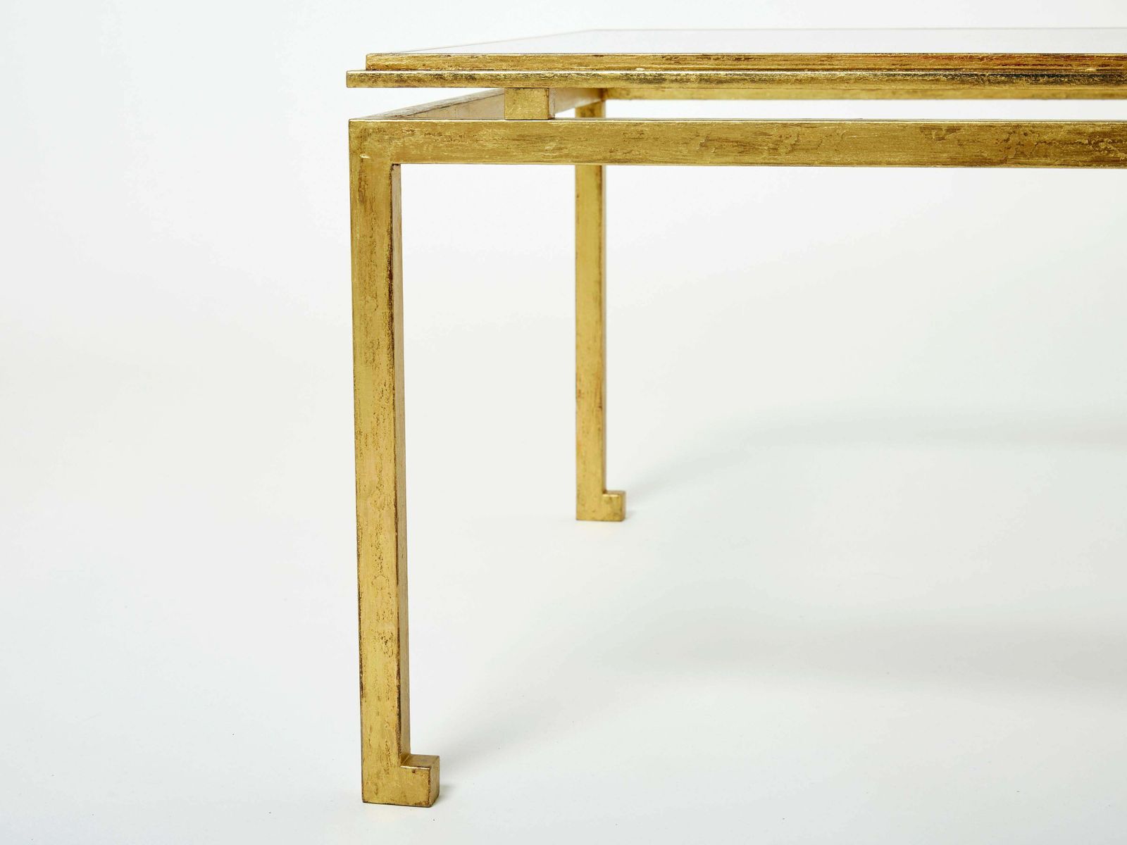 photo furniture Table basse Maison Ramsay en fer doré et verre, 1950
