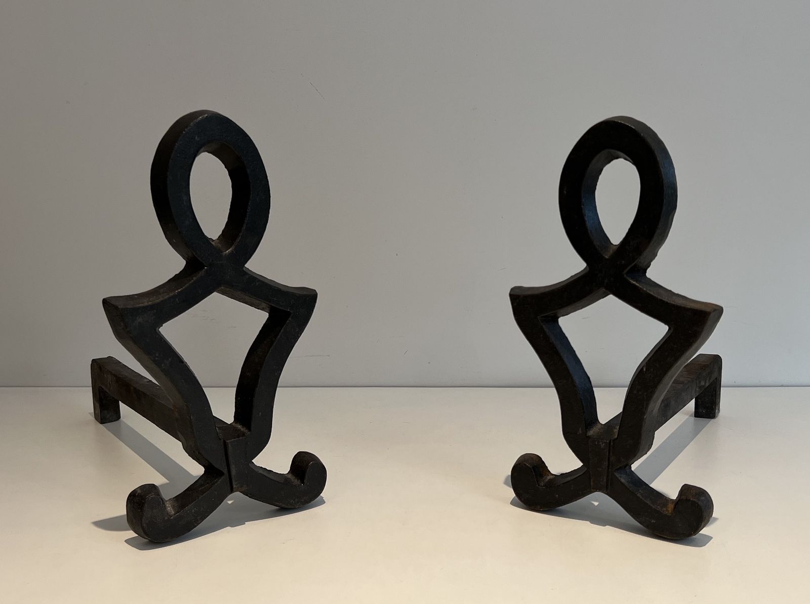 980.0 Pair Of Modernized Cast Iron And Wrought Iron Andirons By Raymond Subes photo